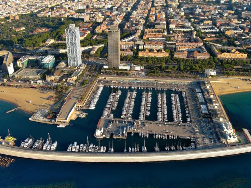 aerial-view-of-barcelona-city-skyline-at-sunrise-2023-04-28-00-44-11-utc-1-1280x720